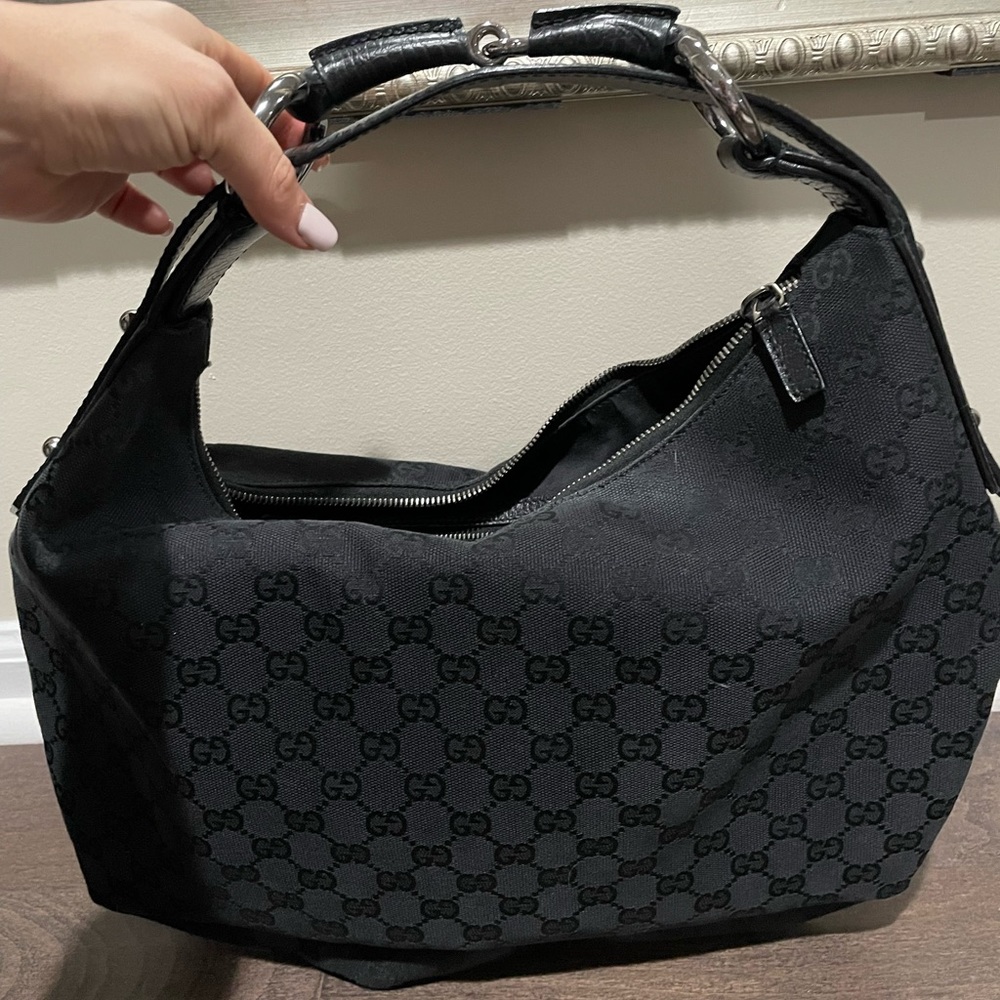 Authentic black Gucci shoulder bag.